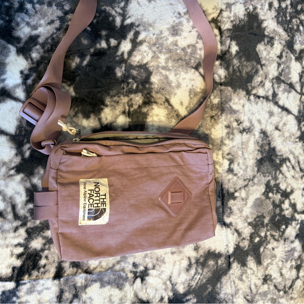 The North Face light purple/pink cross body